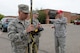 Senior Master Sgt. John Erickson, a training instructor, in red cap, provides instruction about the operation of a global positioning system (GPS) surveying instrument for visiting members of the 142nd Civil Engineer Squadron Tech. Sgt. David Sherman, left, and Staff Sgt. Ken Gleckler during training at the North Dakota Air National Guard Regional Training Site, Fargo, North Dakota, August 18, 2015. The North Dakota Air National Guard Regional Training Site is one of five contingency training locations in the United States used by Air National Guard and U.S. Air Force personnel in the civil engineer career fields. I provides wartime mission training as well as proficiency training on construction practices, utility support, emergency services, maintenance and repair of base infrastructure. Four separate groups totaling about 400 people are scheduled to train at the site in the month of August in 2015. (U.S. Air National Guard photo by Senior Master Sgt. David H. Lipp/Released)