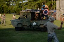 A “tank” comes under siege during the 3rd annual Combat Dining In, Aug. 14, 2015, at Seymour Johnson Air Force Base, North Carolina. All forms of aquatic weaponry were permitted to eliminate enemy threats, including water guns, water balloons, fire hoses, and more. (U.S. Air Force photo/Senior Airman Brittain Crolley)