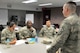 Master Sgt. Jason Oliver, 66th Medical Squadron first sergeant, instructs a Military Professional Writing course to Tech. Sgts. Eleuteria Inman, David Walls and Master Sgt.  Eddie Escamilla Jr., during the Senior NCO Professional Enhancement Course at the Education and Training Center Aug. 18. The course, which leads up to the Senior NCO Induction Ceremony scheduled Aug. 20, is designed to foster leadership skills that the master sergeant selects have learned throughout their Air Force careers. (U.S. Air Force photo by Linda LaBonte Britt)