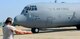 Airman 1st Class Zachary Hitchcock, 37th Airlift Squadron crew chief, marshalls a C-130J Super Hercules away from its parking spot Aug. 16, 2015, at Otopeni Air Base, Romania. Approximately 80 personnel traveled to Otopeni Air Base to participate in Carpathian Summer, a bilateral training exercise designed to increase readiness and interoperability between the U.S. and Romanian air forces. The U.S. Air Force transferred authority to NATO of the three C-130J Super Hercules aircraft participating in the exercise. This Transfer of Authority is a standard procedure that will serve to enhance interoperability and readiness to conduct combined air operations with Romania and NATO. The TOA will end at the conclusion of the exercise. (U.S. Air Force photo/Senior Airman Timothy Moore)