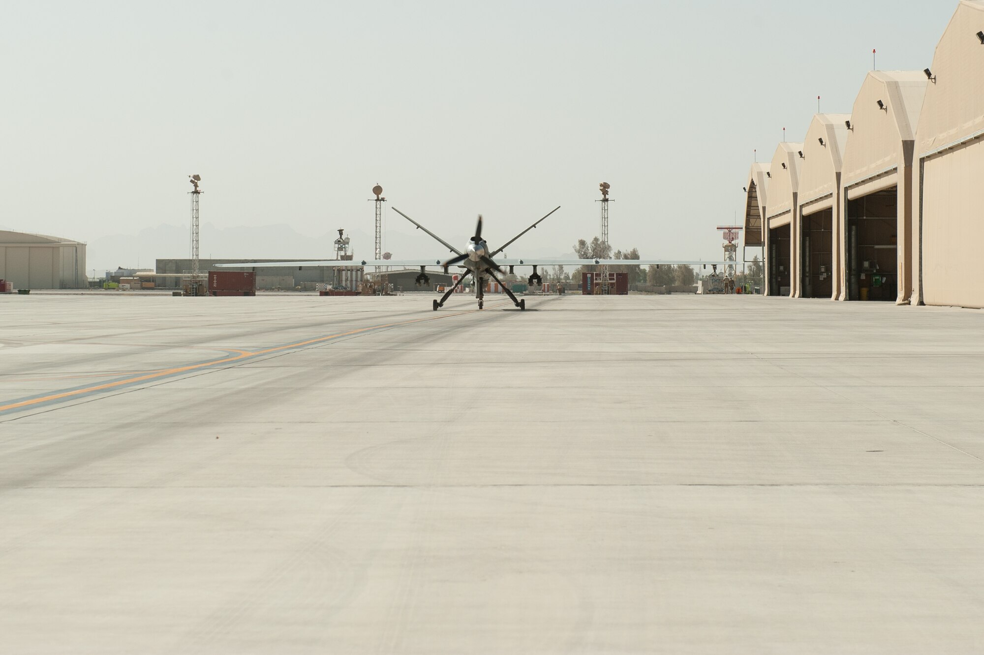 A U.S. Air Force MQ-9 Reaper aircraft assigned to the 62nd Expeditionary Reconnaissance Squadron taxis before taking off from Kandahar Airfield, Afghanistan, Aug. 13, 2015.  The 62nd ERS operates the MQ-1B Predator and Reaper aircraft and provides world-class close air support, intelligence, surveillance and reconnaissance capabilities in Afghanistan. (U.S. Air Force photo by Tech. Sgt. Joseph Swafford/Released)