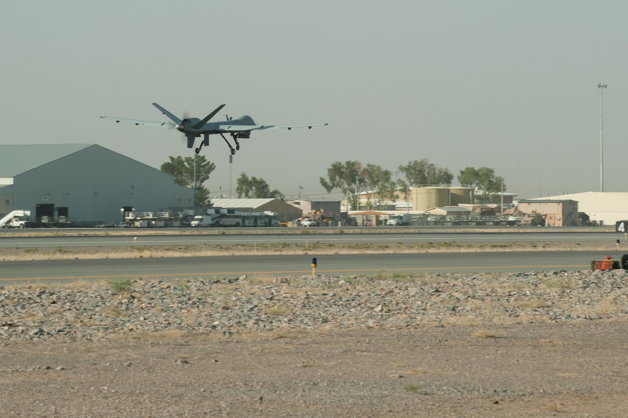 A U.S. Air Force MQ-9 Reaper aircraft assigned to the 62nd Expeditionary Reconnaissance Squadron takes off from Kandahar Airfield, Afghanistan, Aug. 14, 2015.  The 62nd ERS operates the MQ-1B Predator and Reaper aircraft and provides world-class close air support, intelligence, surveillance and reconnaissance capabilities in Afghanistan. (U.S. Air Force photo by Tech. Sgt. Joseph Swafford/Released)