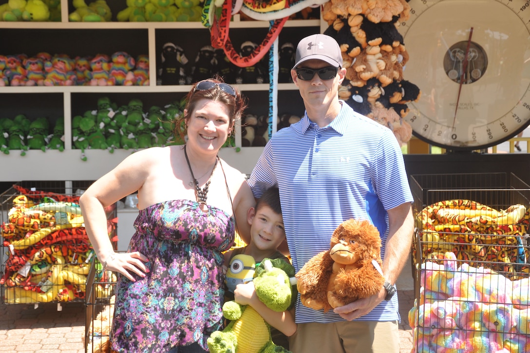 Gunnery Sgt. Rick Levinson, Training Command enlisted aircrew production manager, and spouse Shelley visit Kings Dominion with their son to continue a family tradition at the park. The Levinson family is part of the Headquarters and Service Battalion Family Day held Aug.12. For more than 40 years, Kings Dominion has added major expansions to include its water features Aqua Blast, Water Works, Paradise Plunge, Thunder Falls and Splash Island.