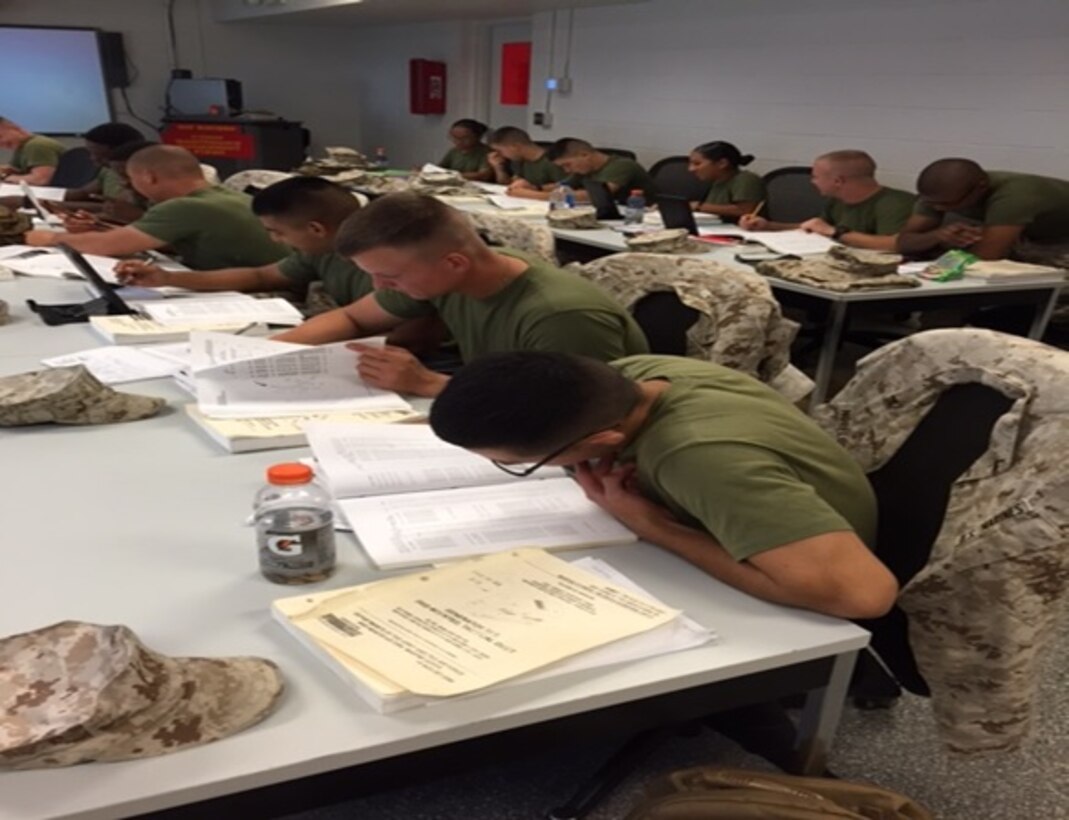 Marines with Marine Corps Engineer School, Utilities Instruction Company, Basic Electrician course 8-15 conduct a practical application exercise on Technical Manuals (TMs) and maintenance management forms aboard Courthouse Bay, Camp Lejeune, North Carolina.  The Marines that come through the Basic Electrician course are given scenarios were they need to identify the parts on equipment that are broken and replace them by finding the correct National Stock Numbers (NSNs) and part numbers.  From this application, Marines learn how to identify appropriate parts to keep mission critical equipment operational in support of the mission.  

