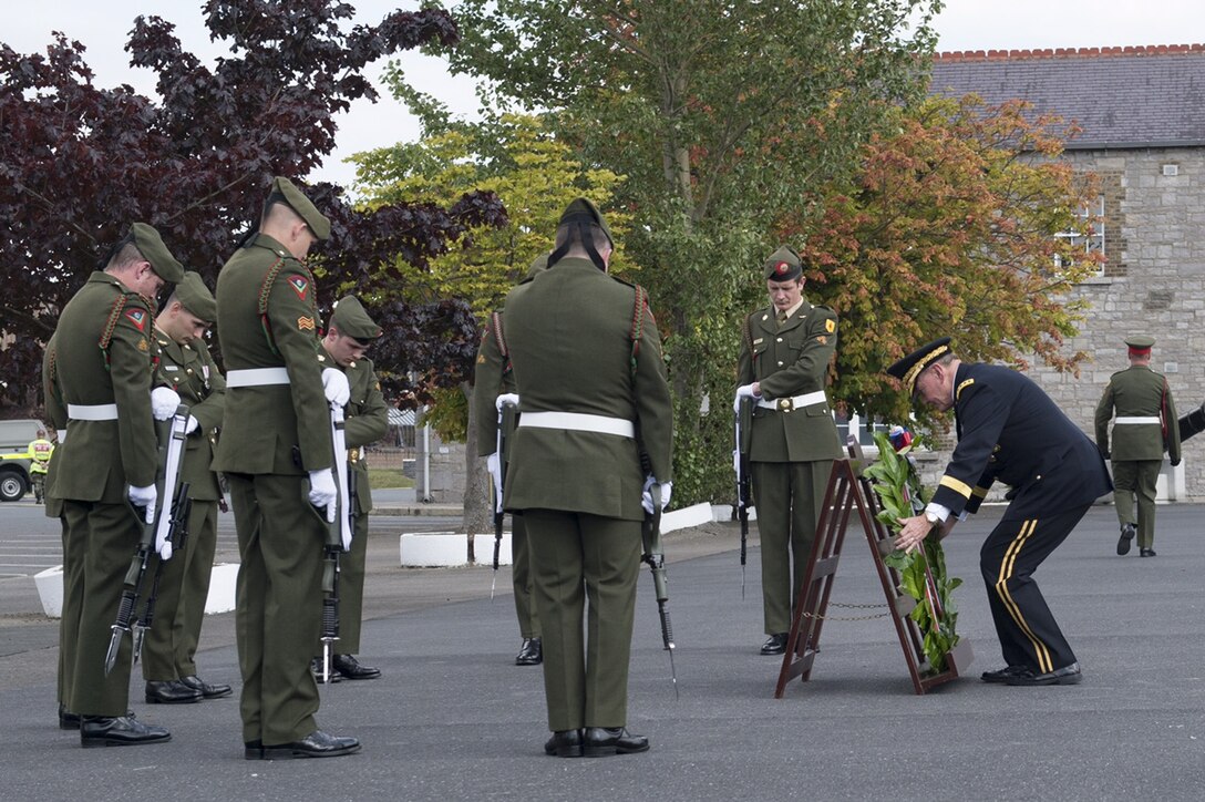 U.S. Army Gen. Martin E. Dempsey, chairman of the Joint Chiefs of Staff, presents a wreath during a ceremony honoring fallen Irish military veterans at Cathal Brugha Barracks in Dublin, Aug. 18, 2015. DoD photo by D. Myles Cullen