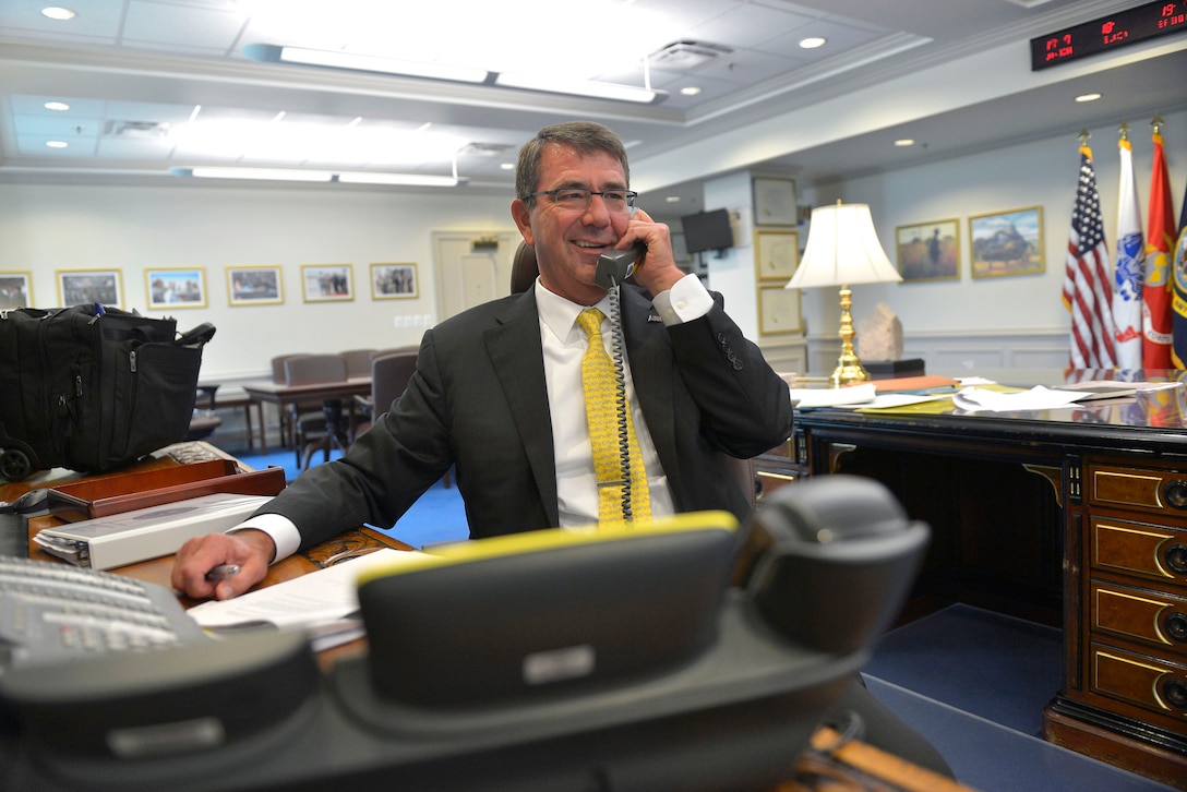 Defense Secretary Ash Carter speaks by phone with Army 1st Lt. Shaye Haver and Capt. Kristen Griest to congratulate the two for their recent graduation from the rigorous Army Ranger School from his office at the Pentagon, Aug. 20, 2015. Haver and Griest are the first women to complete the course after the Army began allowing women to participate in the elite program. DoD photo by Glenn Fawcett 
