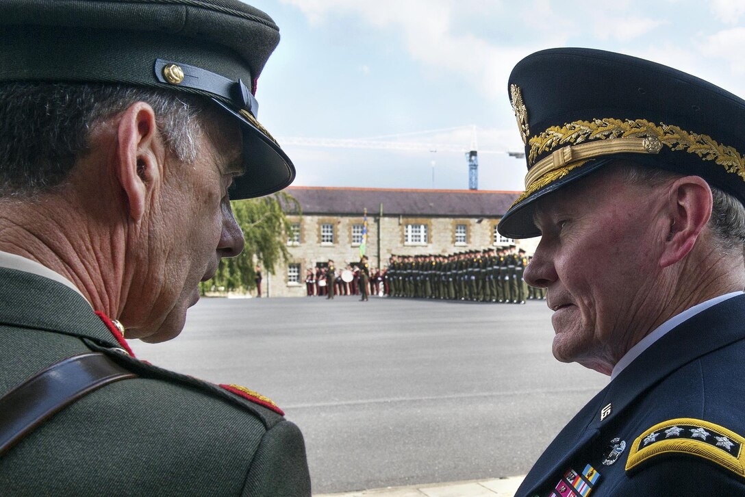 Irish Chief of Defense Lt. Gen. Conor O'Boyle, left, and U.S. Army Gen. Martin E. Dempsey, chairman of the Joint Chiefs of Staff, talk before a pass and review ceremony at the Cathal Brugha Barracks in Dublin, Aug. 18, 2015. DoD photo by D. Myles Cullen