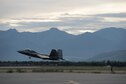 An F-22 Raptor takes off during Red Flag-Alaska at Joint Base Elmendorf-Richardson, Alaska, Aug. 10, 2015. RF-A is an exercise that provides joint offensive counter-air, interdiction, close air support and large force employment training in a simulated combat environment. More than 20 allied countries have participated in RF-A since its conception, improving integration, interoperability and cross-cultural competence. (U.S. Air Force photo/Staff Sgt. Cody H. Ramirez)