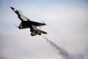 Thunderbird 6 performs a slow pass during the 2015 Dakota Thunder airshow and open house at Ellsworth Air Force Base, S.D., Aug. 16, 2015. More than 51,000 military members, as well as attendees from near and far, engaged in activities throughout the two-day airshow. (U.S. Air Force photo/Senior Airman Rebecca Imwalle)