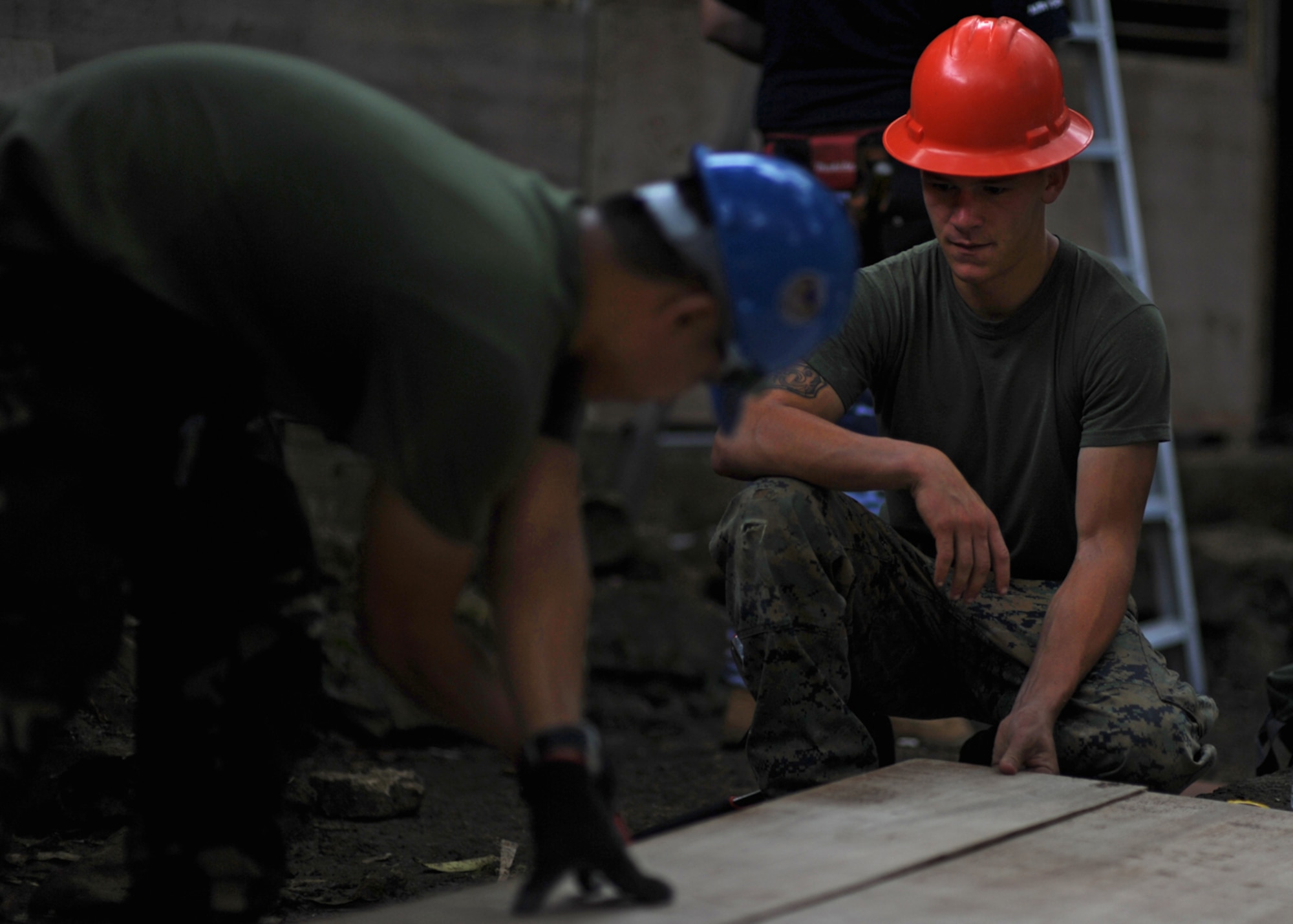U.S. Marine Corps Lance Cpl. Aaron Marley, a carpenter with the 7th Engineer Support Battalion, Camp Pendleton, California, assists a member of the Armed Forces of the Philippines throughout the repairs made to Bartolome Doria Elementary School during Pacific Angel Philippines, Bohol Provence, Philippines, Aug. 15, 2015. This was one of six schools repaired by the U.S. Air Force, U.S. Army and U.S. Marine Corps along with service members from the Philippines and Australia. Efforts undertaken during Pacific Angel help multilateral militaries in the Pacific improve and build relationships across a wide spectrum of civic operations, which bolsters each nation’s capacity to respond and support future humanitarian assistance and disaster relief operations. (U.S. Air Force photo by Tech. Sgt. Aaron Oelrich/Released)