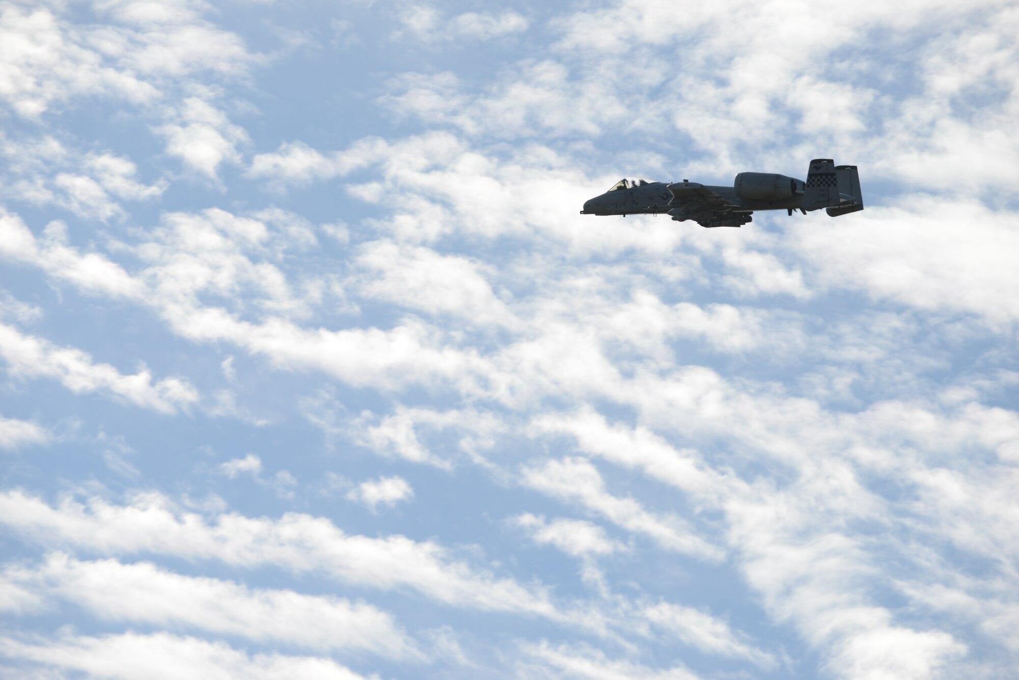 A U.S. Air Force A-10 Thunderbolt II assigned to the 25th Fighter Squadron, Osan Air Base, Republic of Korea, flies a sortie in the Joint Pacific Alaska Range Complex, Aug. 17, 2015, during RED FLAG-Alaska (RF-A) 15-3. The demonstration was for the Executive Observer Program, which is designed to present Pacific Air Force’s premier multinational large force employment exercise while building partnerships with senior airpower leaders from the global community. (U.S. Air Force photo by Senior Airman Ashley Nicole Taylor/Released)