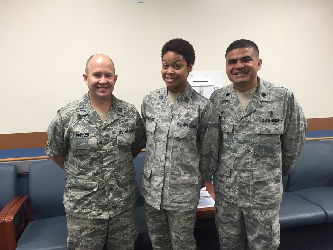 The Air Force Personnel Center officials announced  that  15 officers of the 79th Medical Wing have been selected for promotion  on Aug. 20. Capt. Michael Scannon and Capt. Amanda Ferguson are congratulated by Lt. Col. Jose Sorto, 579th Medical Group Support Squadron Commander on their recent promotion.
 