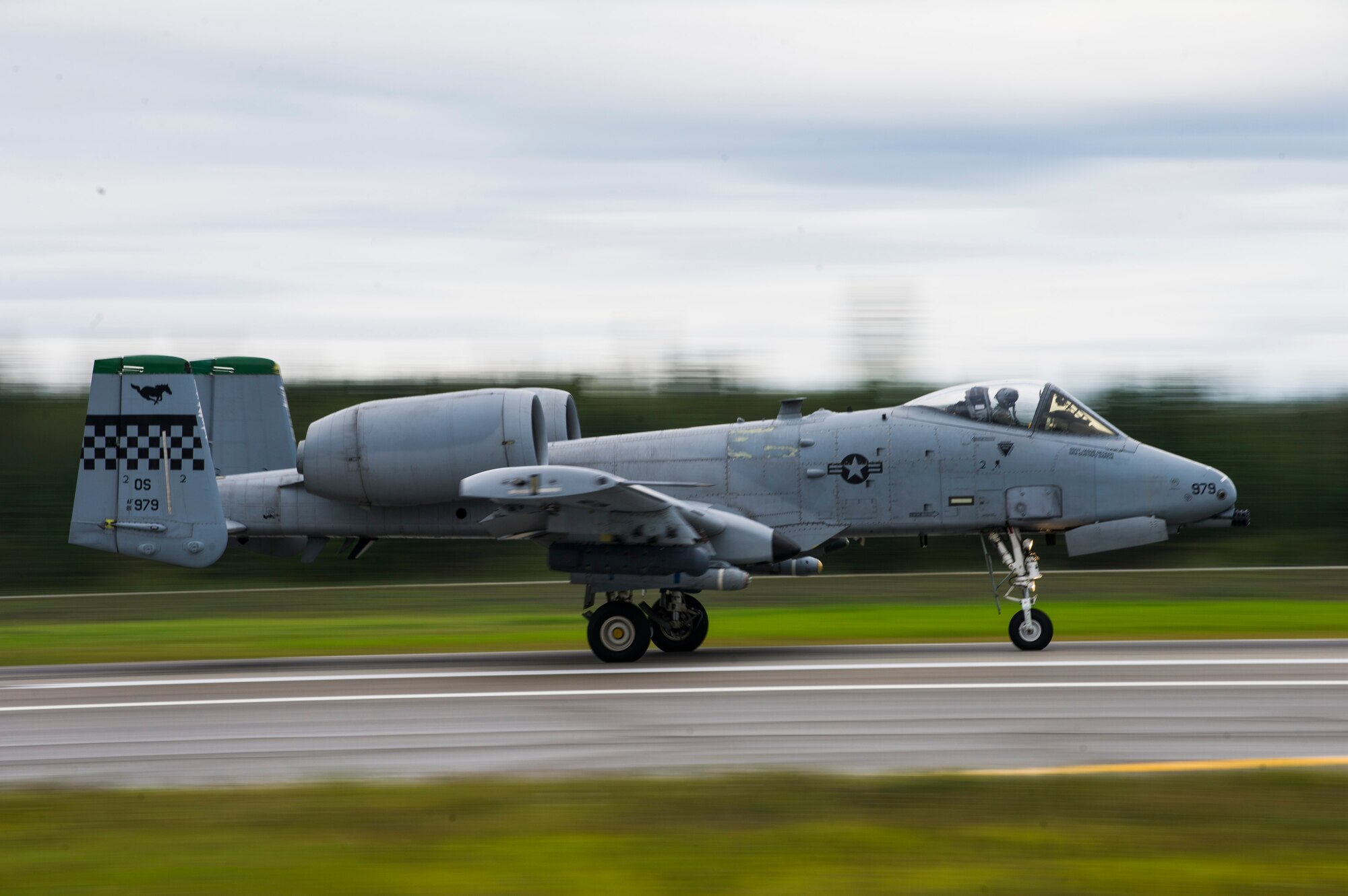 A U.S. Air Force A-10 Thunderbolt II aircraft assigned to the 25th Fighter Squadron from Osan Air Base, Republic of Korea, takes off from Eielson Air Force Base, Alaska, Aug. 20, 2015, during RED FLAG-Alaska (RF-A) 15-3. RF-A is a series of Pacific Air Forces commander-directed field training exercise for U.S. and partner nation forces, providing combined offensive counter-air, interdiction, close air support and large force employment training in a simulated combat environment. (U.S. Air Force photo by Staff Sgt. Joshua Turner/Released)