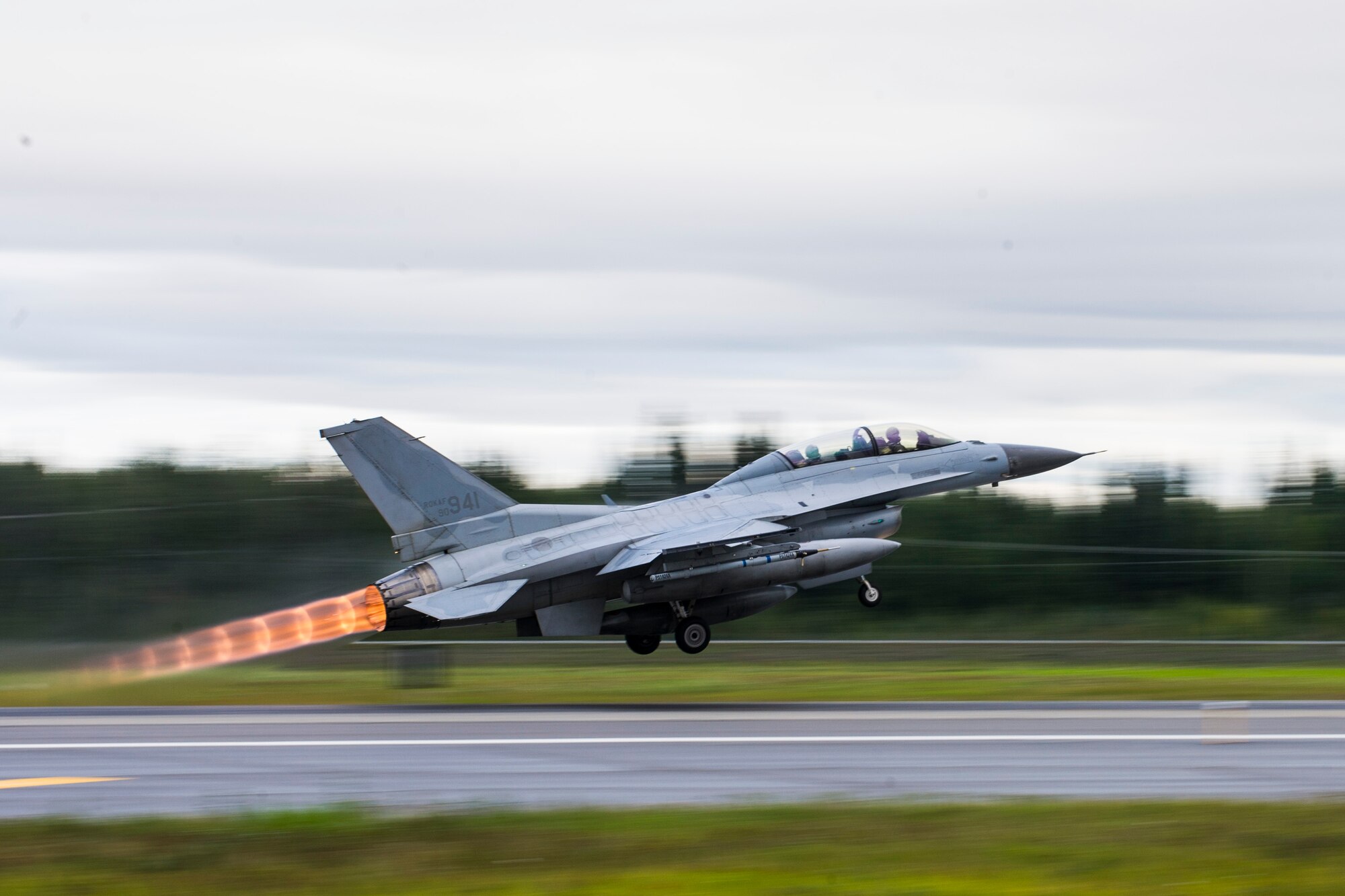 A Republic of Korea Air Force (ROKAF) F-16D Fighting Falcon takes off from Eielson Air Force Base, Alaska, Aug. 20, 2015, during RED FLAG-Alaska (RF-A) 15-3. ROKAF and Japan Air Self-Defense Force units are deployed to Eielson along with assorted aircraft and support personnel from multiple service branches for RF-A, a series of Pacific Air Forces commander-directed field training exercise for U.S. and partner nation forces, providing combined offensive counter-air, interdiction, close air support, and large force employment training in a simulated combat environment. (U.S. Air Force photo by Staff Sgt. Joshua Turner/Released)
