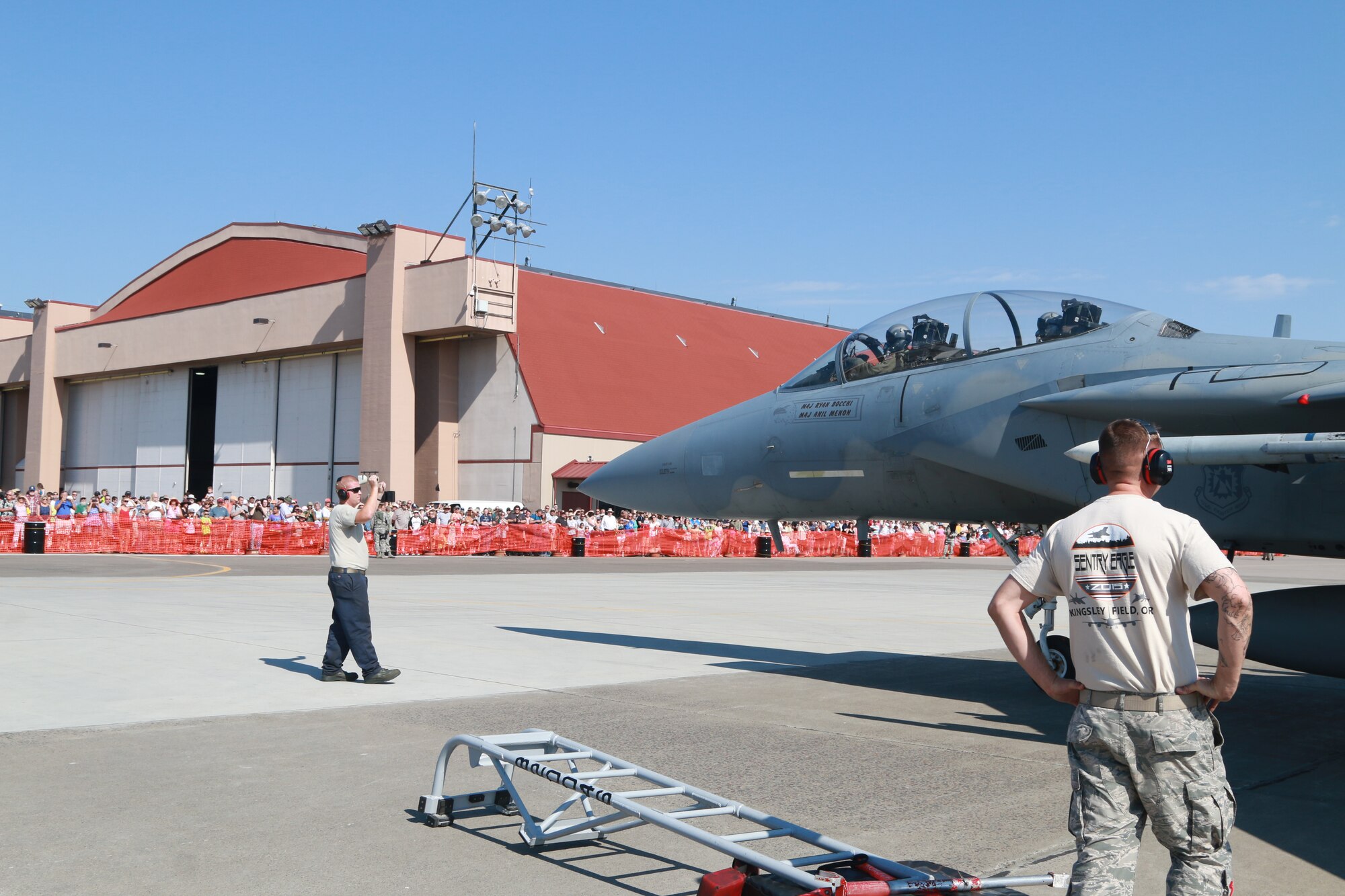 Members of the community watch as 173rd Fighter Wing F-15 crew chiefs launch an F-15 Eagle during the base Open House held at Kingsley Field, Klamath Falls, Ore. Aug. 1, 2015 in conjunction with the Sentry Eagle exercise.  Sentry Eagle is a multiforce exercise hosted by the 173rd Fighter Wing, Ore. ANG.  Multiple aircraft from across the country participate in the dissimilar air combat training over a four day period.  (U.S. Air National Guard photo by Master Sgt. Jennifer Shirar/released)