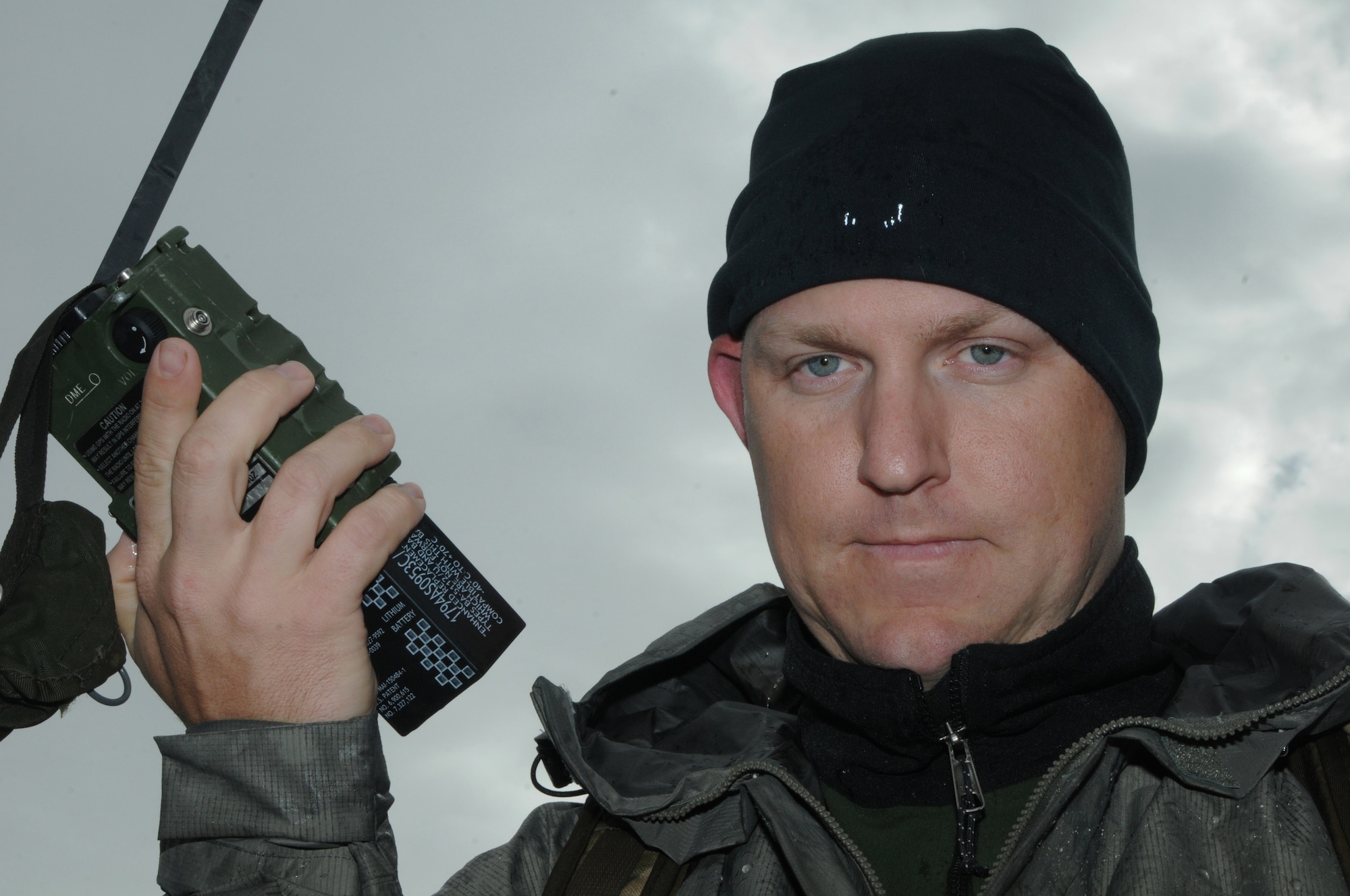 U.S. Air Force Tech. Sgt. Ben Westveer, a rescue specialist with the Alaska Air National Guard's 212th Rescue Squadron, makes radio contact during a downed pilot exercise at Eielson Air Force Base, Alaska, Aug. 12, 2015, while participating in RED FLAG-Alaska (RF-A) 15-3.  RF-A is a Pacific Air Forces commander-directed field training exercise for U.S. and partner nation forces, providing combined offensive counter-air, interdiction, close air support and large force employment training in a simulated combat environment.  (U.S. Air Force photo by Master Sgt. Ralph Kapustka/Released)