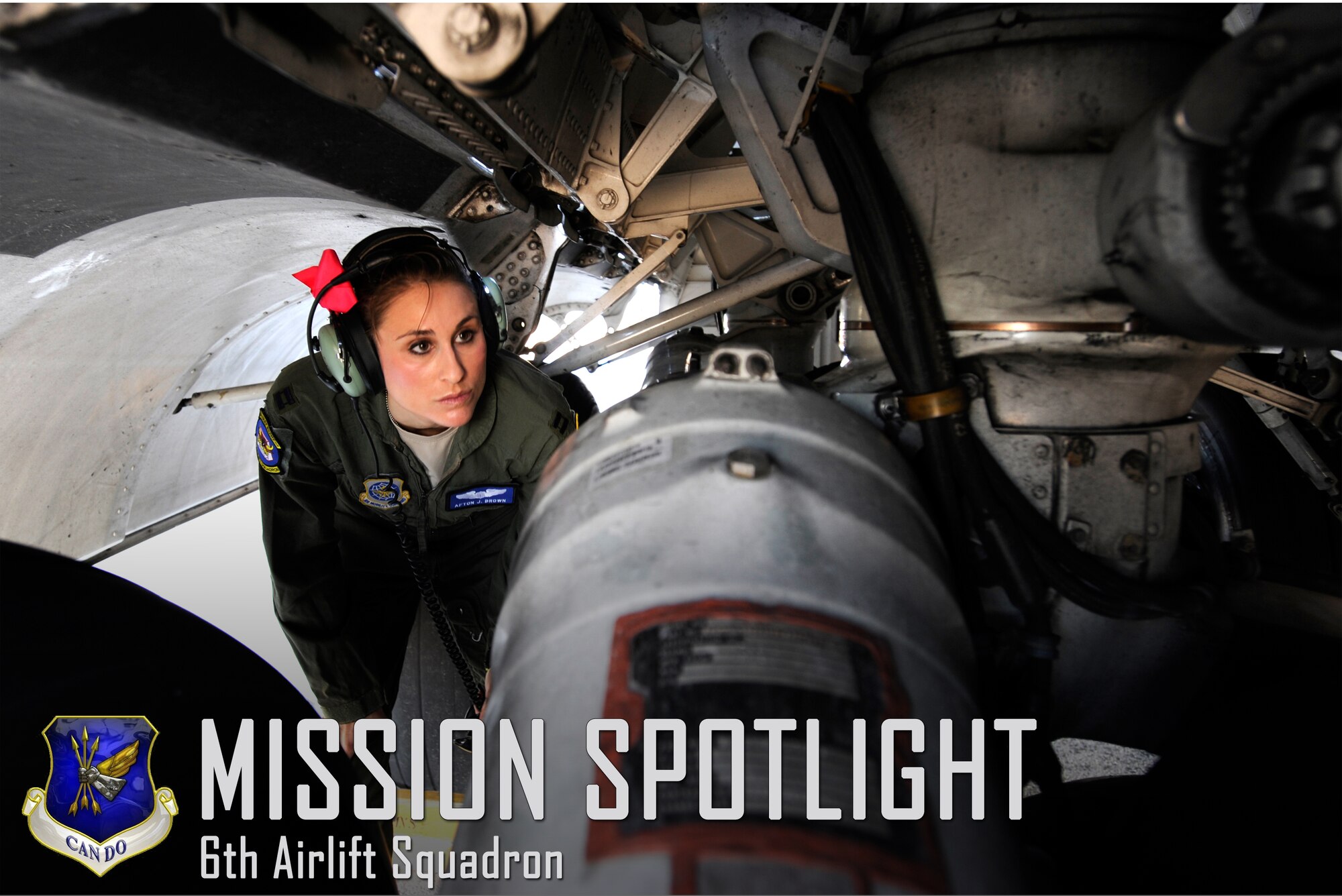 Capt. Afton Brown, 6th Airlift Squadron pilot, inspects the landing gear of a C-17 Globemaster III Aug. 13, 2015, at Joint Base McGuire-Dix-Lakehurst, N.J. Inspecting C-17 components is required before an aircraft can take off to ensure the safety of the aircraft and crew on board. (U.S. Air Force photo by Senior Airman Sean M. Crowe/Released)