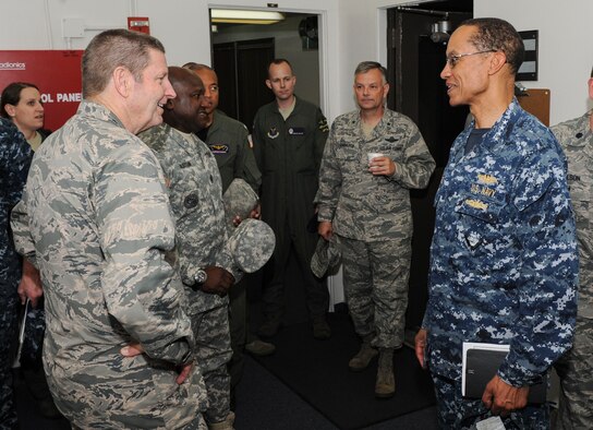 Gen. Robin Rand, Air Force Global Strike Command commander, greets Adm. Cecil D. Haney, U.S. Strategic Command (USSTRATCOM) commander, at Vandenberg Air Force Base, Calif., Aug. 19, 2015. Both commanders visited the base to view the launch of a Minute Man III Intercontinental Ballistic Missile, which was shipped to the site from Minot Air Force Base, N.D. (U.S. Air Force photo/Senior Airman Stephanie Morris)