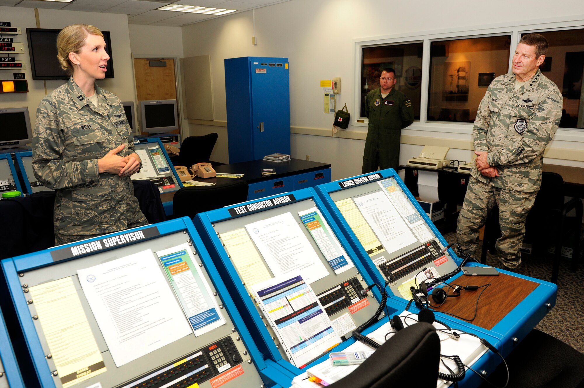 Gen. Robin Rand, commander of Air Force Global Strike Command, is briefed by Capt. Karrie Wray, 576th Flight Test Squadron ICBM test manager, during a tour of the 576th FLTS Aug. 18, 2015, Vandenberg Air Force Base, Calif. (U.S. Air Force photo by Staff Sgt. Jim Araos/Released)