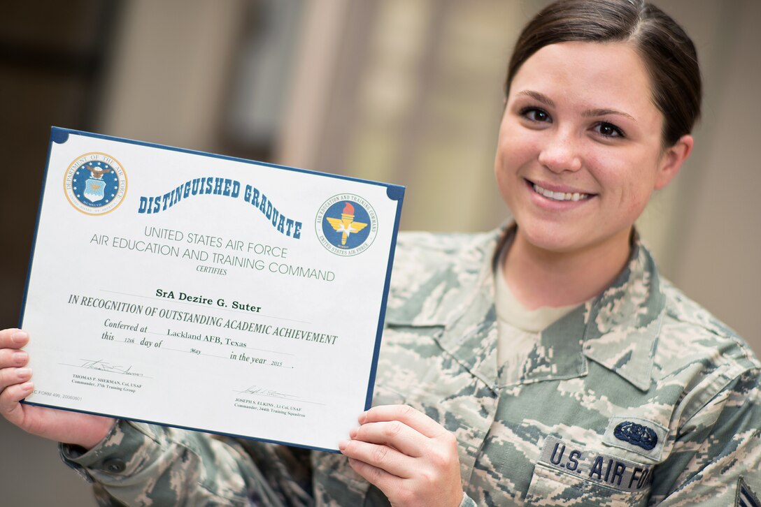 Senior Airman Dezire Suter, 137 ARW production recruiter, was the distinguished graduate from the Air National Guard recruiting school at Joint Base San Antonio, Texas on May 12, 2015. (U.S. Air National Guard photo by Master Sgt. Andrew M. LaMoreaux/Released)