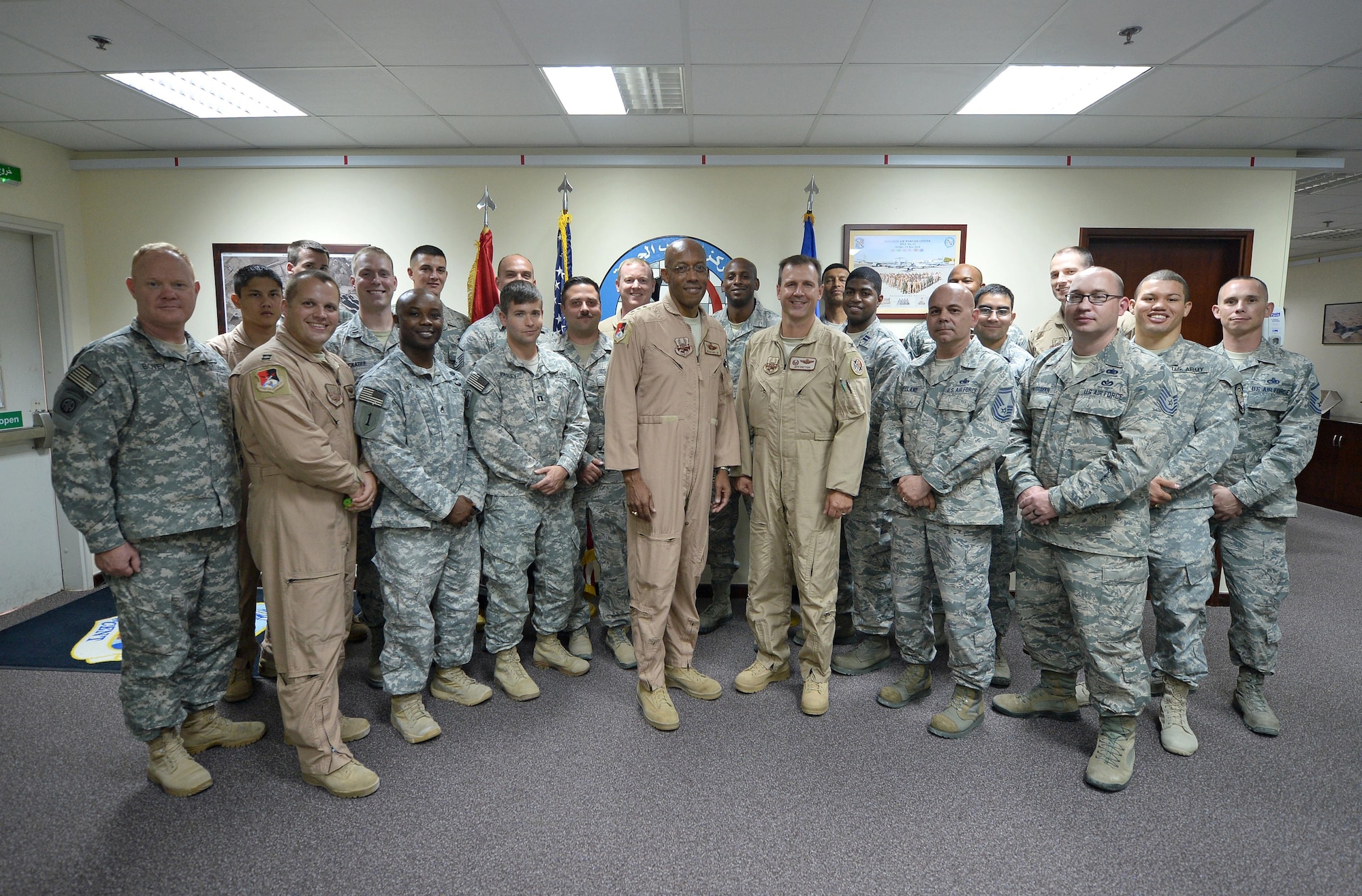 Lt. Gen. C. Q. Brown Jr., commander of U.S. Air Forces Central Command, poses with Airmen and Soldiers from the Air Warfare Center after a change of command ceremony Aug. 12, 2015. The Air Warfare Center was first conceived in 2000 at the Middle East Air Symposium with a vision of a large force training course to develop tactical leaders for Gulf Cooperation council air forces.  (U.S. Air Force photo/Tech. Sgt. Jeff Andrejcik)