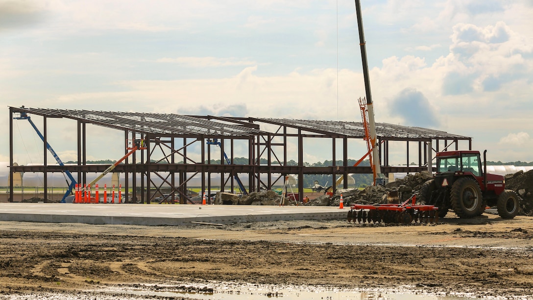 The structure of the new F-35B Lightning II hangar begins to appear aboard Marine Corps Air Station Beaufort, S.C. Aug. 20. The construction started with laying the foundation of the structure last year. Now the frame of the finished product has begun to take shape on the flight line.