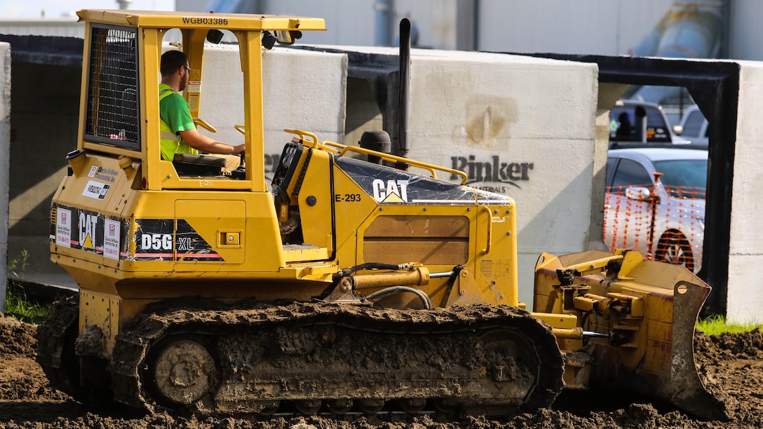 A construction worker continues work on an F-35B Lightning II hangar aboard Marine Corps Air Station Beaufort, Aug. 20. The installation is scheduled to be fully completed next year. “This hangar is the newest addition to the F-35 program,” said Pete Robson, the supervisory construction manager with public works aboard MCAS Beaufort. “It is the second F-35 hangar built aboard MCAS Beaufort to support the program and both hangars will operate simultaneously”