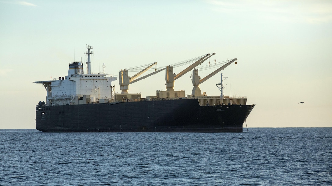 The USNS 1st Lt. Jack Lummus awaits offload during an in-stream Marine Prepositioning Force Exercise off the coast of Marine Corps Support Facility Blount Island, Florida, Aug. 19, 2015. Marines with Combat Logistics Regiment 25 and sailors with Naval Beach Group 2 joined forces for the latest iteration of MPFEX, which saw service members offloading the Lummus using Lift-on/Lift-Off and Roll-on/Roll-off procedures.