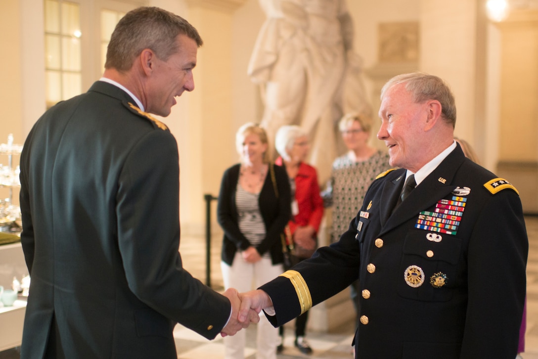 Danish Chief of Defense Gen. Peter Bartram and U.S. Army Gen. Martin E. Dempsey, chairman of the Joint Chiefs of Staff, shake hands as they conclude their visit in Copenhagen, Denmark, Aug. 18, 2015. DoD photo by D. Myles Cullen