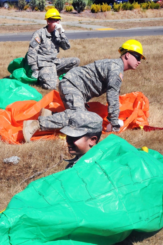 Soldiers prepare to serve as firefighters to assist the National Interagency Fire Center on Joint Base Lewis-McChord, Wash., Aug. 19, 2015. U.S. Army photo by Sgt. Quanesha Deloach