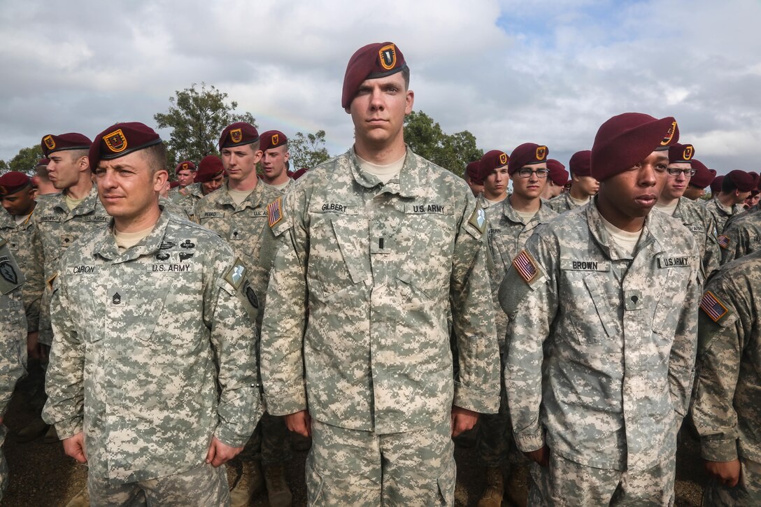 U.S. soldiers participating in Pacific Pathways stand in formation during an Australian jump wing pinning ceremony at Shoalwater Bay Training Area near Rockhampton, Australia, July 9, 2015. Lt. Gen. Stephen R. Lanza, the commanding general of the Army’s I Corps, said the corps has projected power in the Asia-Pacific region through Pacific Pathways, in which a brigade combat team goes to three different countries over a four-month period to conduct operations.