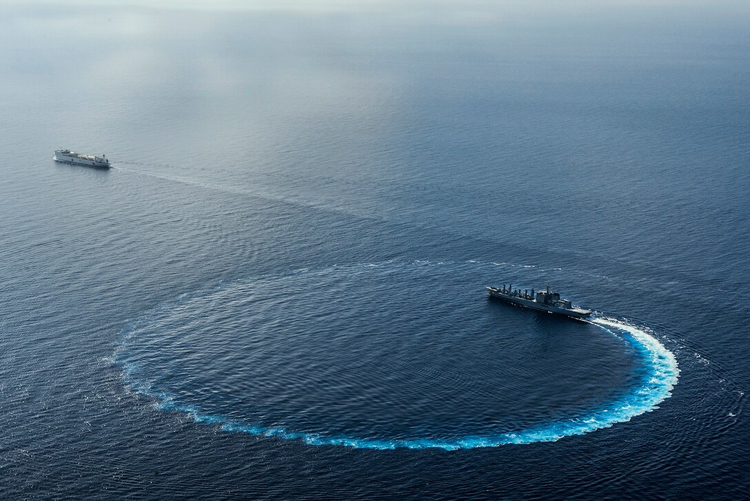 The Japanese fleet oiler JS Mashu participates in a replenishment with the hospital ship USNS Mercy during Pacific Partnership 2015 in the Pacific Ocean, Aug. 13, 2015. The partnership exercise is the largest annual multilateral humanitarian assistance and disaster relief preparedness mission in the Indo-Asia-Pacific region. U.S. Navy photo by Petty Officer 2nd Class Mark El-Rayes
