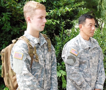 Pfc. Evan Schneider (left), former Make-A-Wish Foundation recipient and member of the California State Military Reserve, and Maj. Gen. K.K. Chinn, U.S. Army South commanding general, listen to a briefing at the Warrior and Family Support Center at Fort Sam Houston Aug. 7. Schneider and Chinn met more than a decade ago when Schneider’s wish was to become an Army Ranger. The two stayed in touch over the years. 