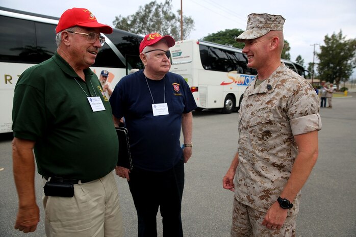 Sergeant Major William T. Sowers, the 1st Marine Division sergeant major, speaks with two Vietnam veterans that are members of the 1st Mar. Div. Association during their 68th annual reunion, aboard Marine Corps base Camp Pendleton, Calif., Aug. 20, 2015. During the reunion, veterans visited their old stomping grounds and reminisced about their days serving in the division, while also observing the capabilities of today’s Marines. (U.S. Marine Corps photo by Cpl. Demetrius Morgan/RELEASED)