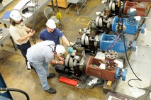 An extensive outage for maintenance occurs at Hypervelocity Wind Tunnel 9 once every five to ten years. After a complete tear down and refurbishment, the facility’s operation and maintenance staff rig one of nine high-pressure control valves in order to lift it into place. These valves are uniquely designed to handle the volumetric flow rates of the wind tunnel.  (Photo by AJ Spicer)