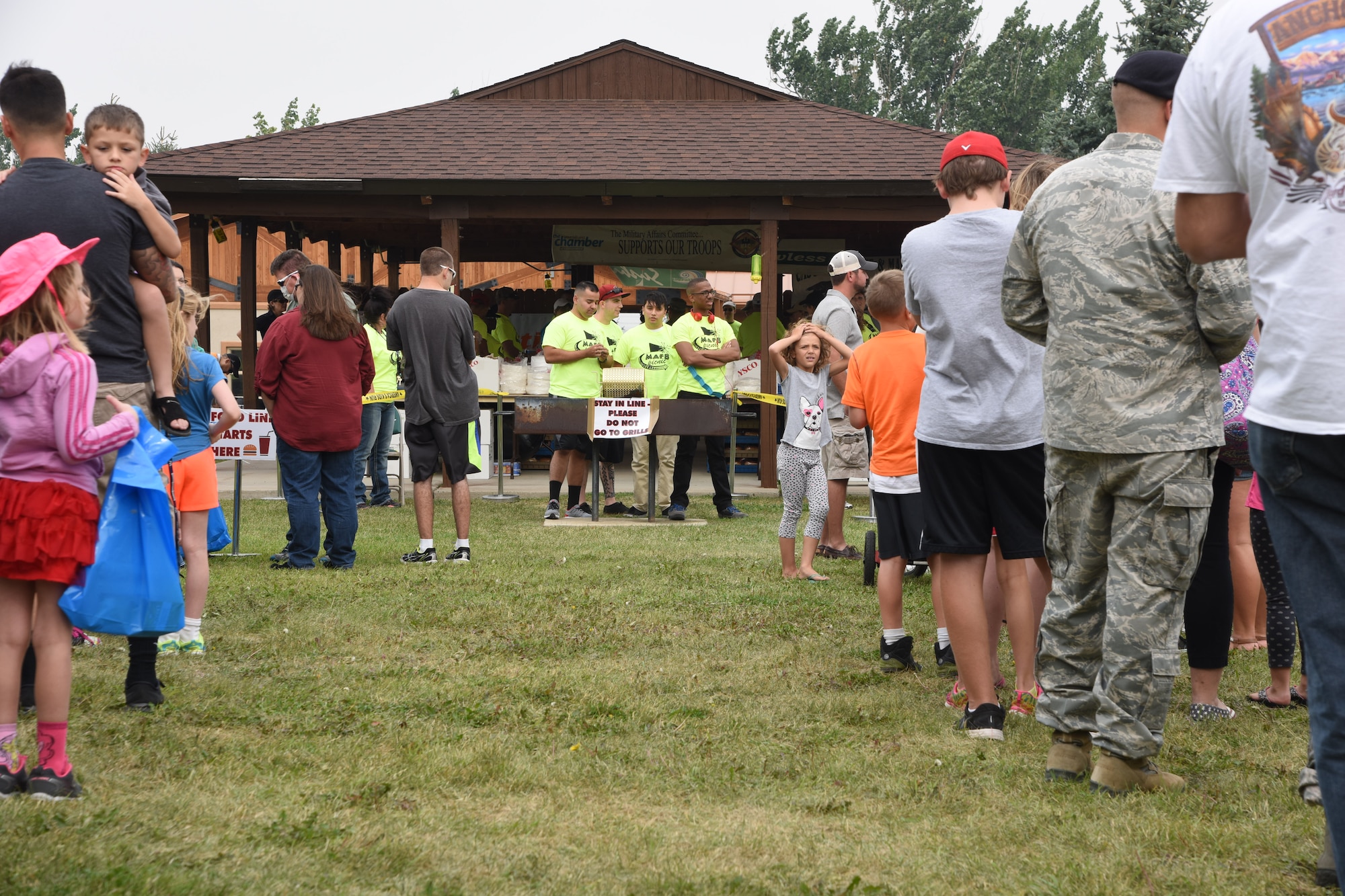 Team Malmstrom members hand out raffle tickets during a base picnic at Sun Plaza Park at Malmstrom Air Force Base Aug 21. More than $4,000 worth of prizes were given away during the annual event.   (U.S. Air Force Photo/Airman 1st Class Collin Schmidt) 