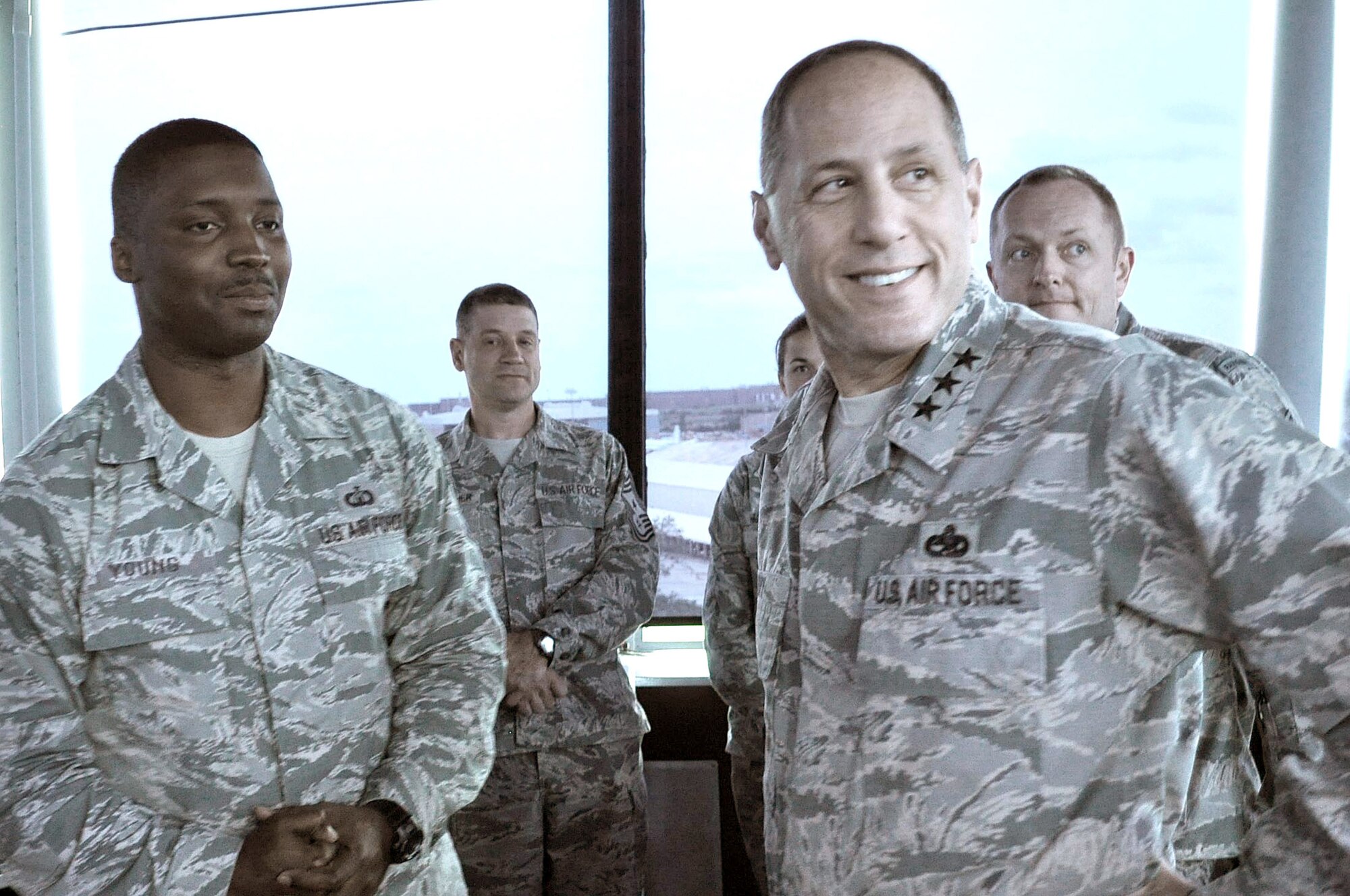 Tech. Sgt. Michael Young of the 72nd Operations Support Squadron discusses air traffic operations in the control tower with Air Force Sustainment Center Commander Lt. Gen. Lee Levy II during his immersion visit to the wing. The tower was originally built in 1962 and tops AFMC’s MILCON list for replacement in fiscal 2016. It will cost $12.9 million to replace the aging facility. (Air Force photo by Marlin Zimmerman/Released)