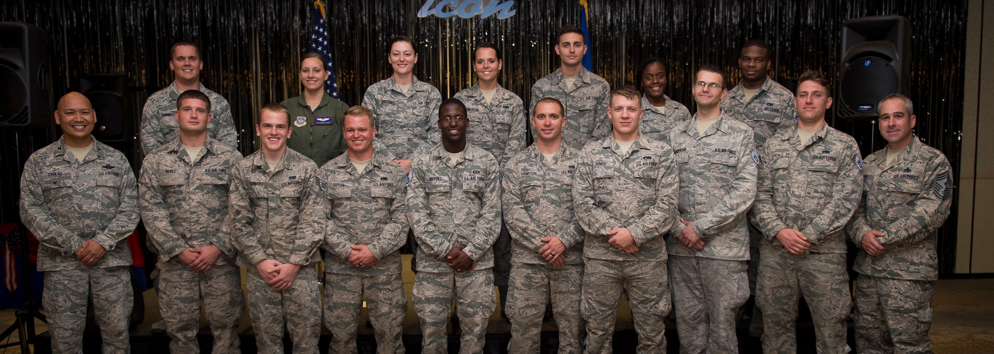 Col. Jimmy Canlas, 437th Airlift Wing vice commander (left) and Chief Master Sgt. Kristopher Berg, 437th AW command chief (right), stand with Staff Sgt. selects from the 437th AW Aug. 20, 2015, at the Charleston Club on Joint Base Charleston, S.C. The purpose of the event was to highlight the achievement, acknowledge the selectees and give them an opportunity to celebrate and socialize with other selectees, friends and family. (U.S. Air Force photo/Airman 1st Class Clayton Cupit)