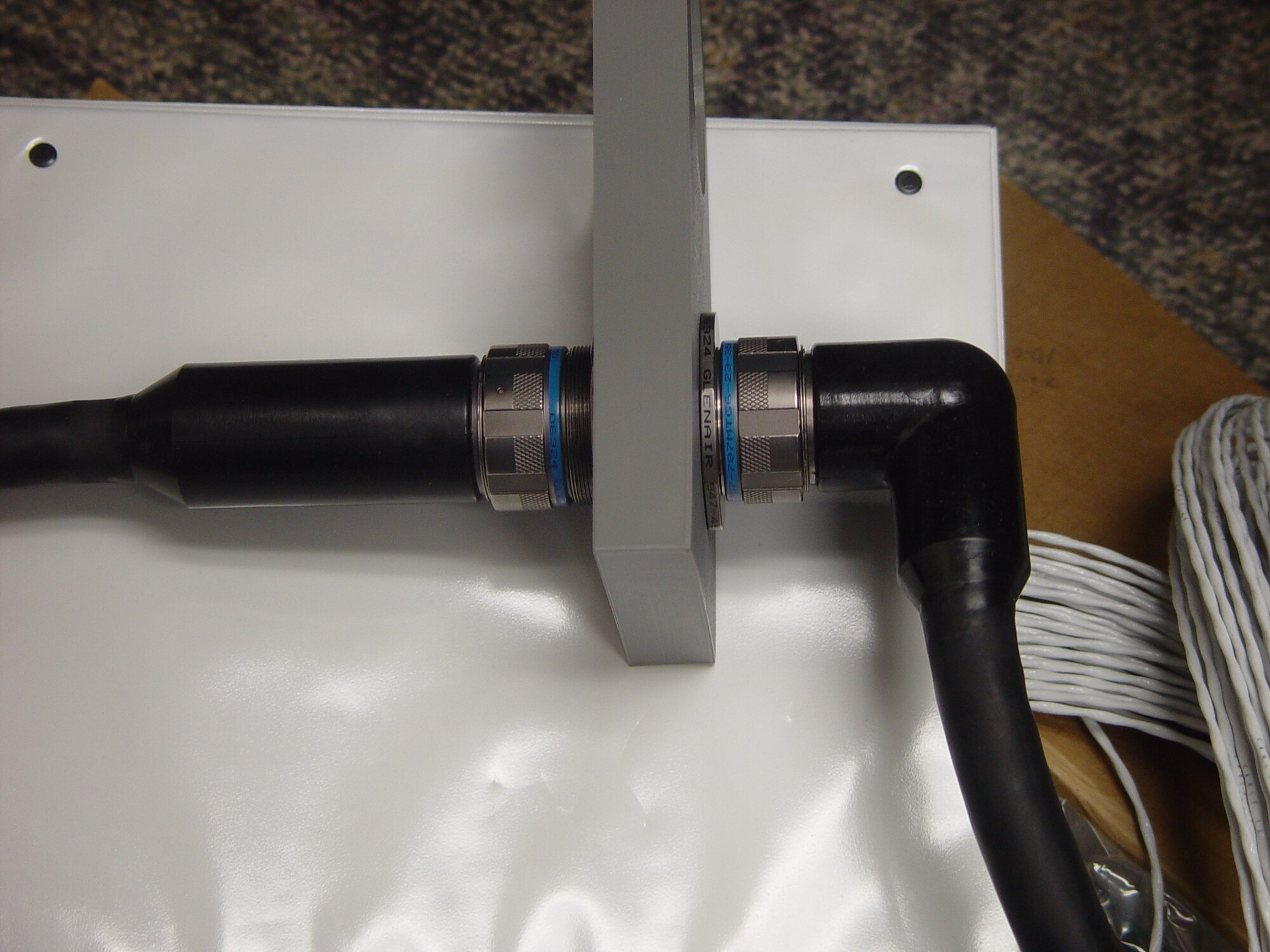 The compact design and 90 degree offset of the new bulkhead feedthrough assembly saves valuable space inside each enclosure. (Photo provided)