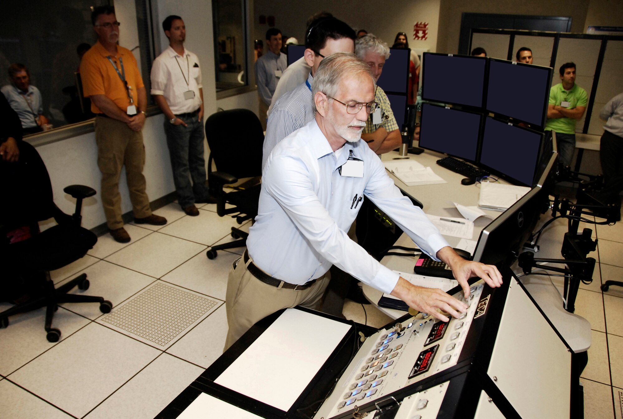 James Brooks, ATA rocket test manager, pictured, starts the final countdown for the 2,500th solid rocket motor test and last test he will be a part of at J-6 before retiring from AEDC. (Photo by Rick Goodfriend)