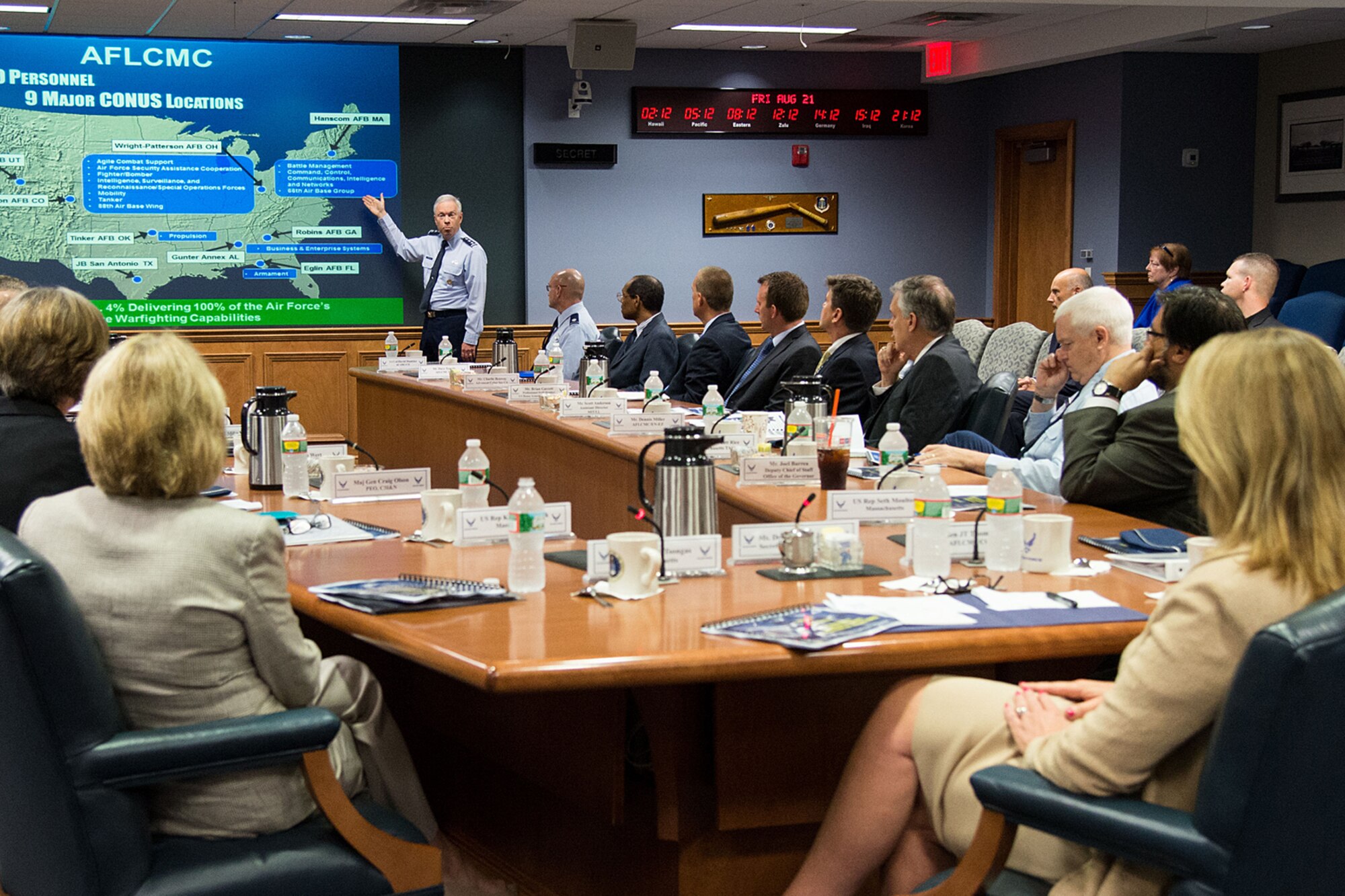 Lt. Gen. John Thompson, Air Force Life Cycle Management Center commander, provides a mission overview to Secretary of the Air Force Deborah Lee James, right, and others during a briefing in Building 1606 Aug. 21. During James visit to Hanscom, James viewed technology demonstrations, met with the governor, members of the Mass. congressional delegation and other local leaders, and had lunch with individual Airmen to hear their concerns. (U.S. Air Force photo by Mark Herlihy)