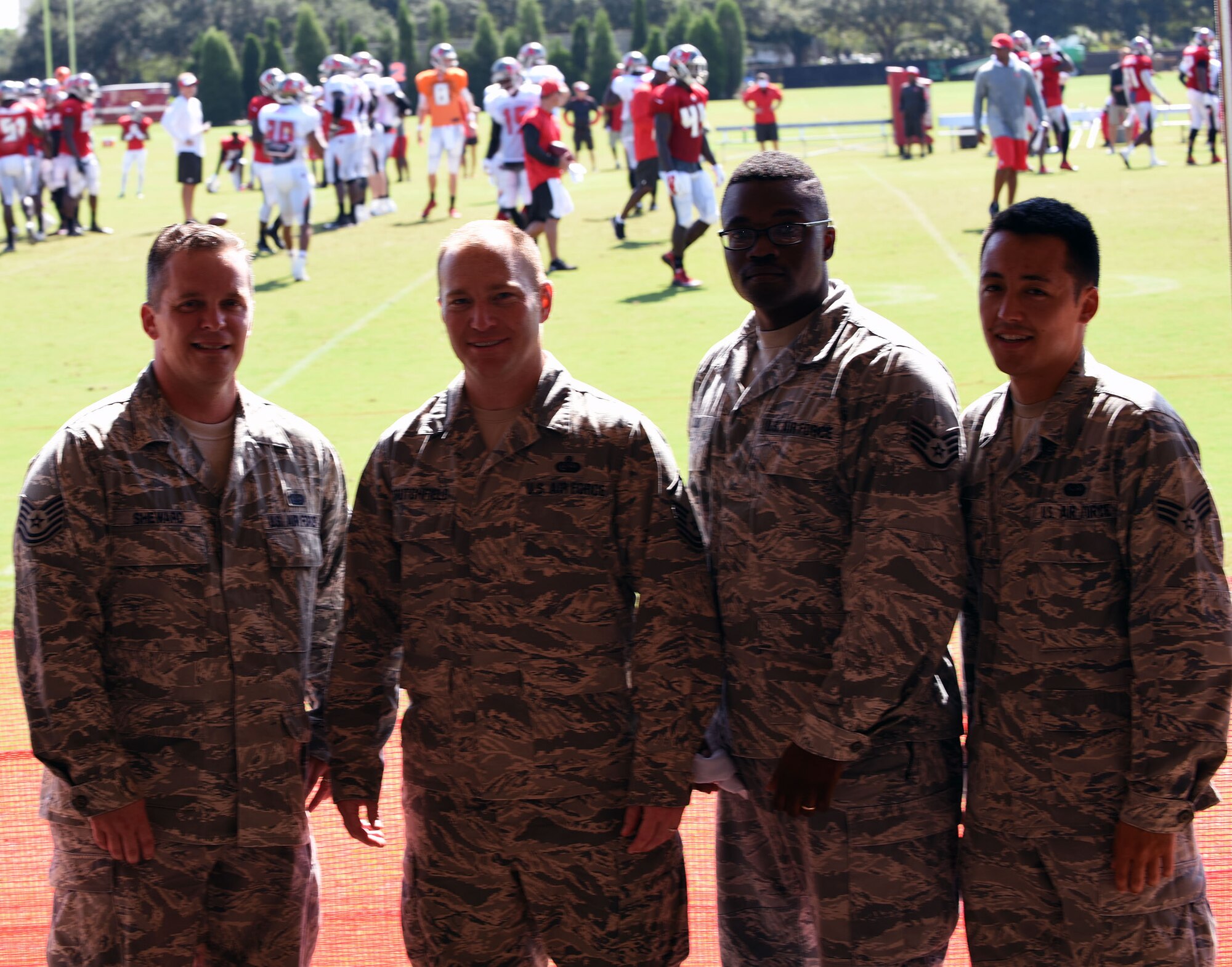 Military members from MacDill Air Force Base showed up in force to cheer on their hometown team, the Tampa Bay Buccaneers. Closed to the general public, the Bucs opened their gates and completed their final day of training camp with a Salute to the Military. (U.S. Air Force Photo/Staff Sgt. Adam Borgman)