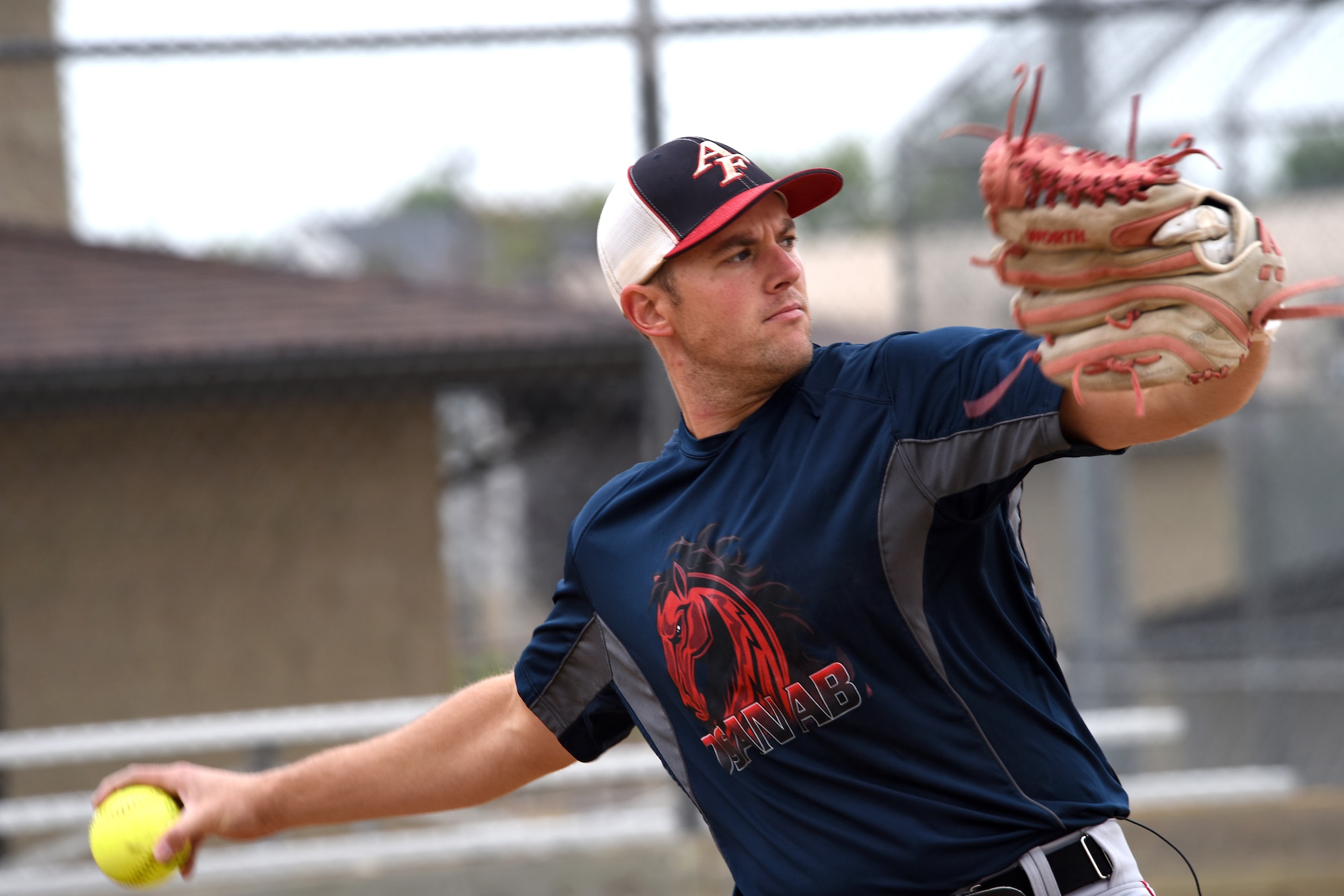 Staff Sgt. Jimmy Fulcher, 341st Security Forces Group evaluator, practices on the baseball field Aug. 17, 2015, at Malmstrom Air Force Base, Mont. Fulcher has been training to try out for the Air Force men's softball team.  (U.S. Air Force photo/Chris Willis) 