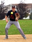 Staff Sgt. Jimmy Fulcher, 341st Security Forces Group evaluator, practices on the baseball field Aug. 17, 2015, at Malmstrom Air Force Base, Mont. Fulcher has been training to try out for the Air Force men's softball team.  (U.S. Air Force photo/Chris Willis) 