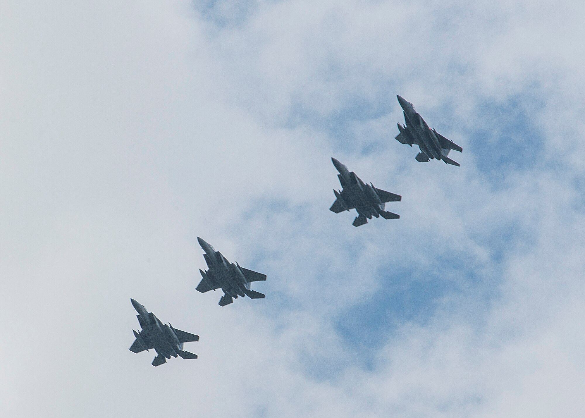 Four F-15 Eagles from the 44th Fighter Squadron arrive at Tsuiki Air Base, Japan, Aug. 21, 2015. Members participating in the ATR are from various units under the 18th Wing and will be given the opportunity to practice deployed operations and perform bilateral training in a joint environment alongside the JASDF’s 8th Air Wing. (U.S. Air Force photo by Senior Airman Stephen G. Eigel)