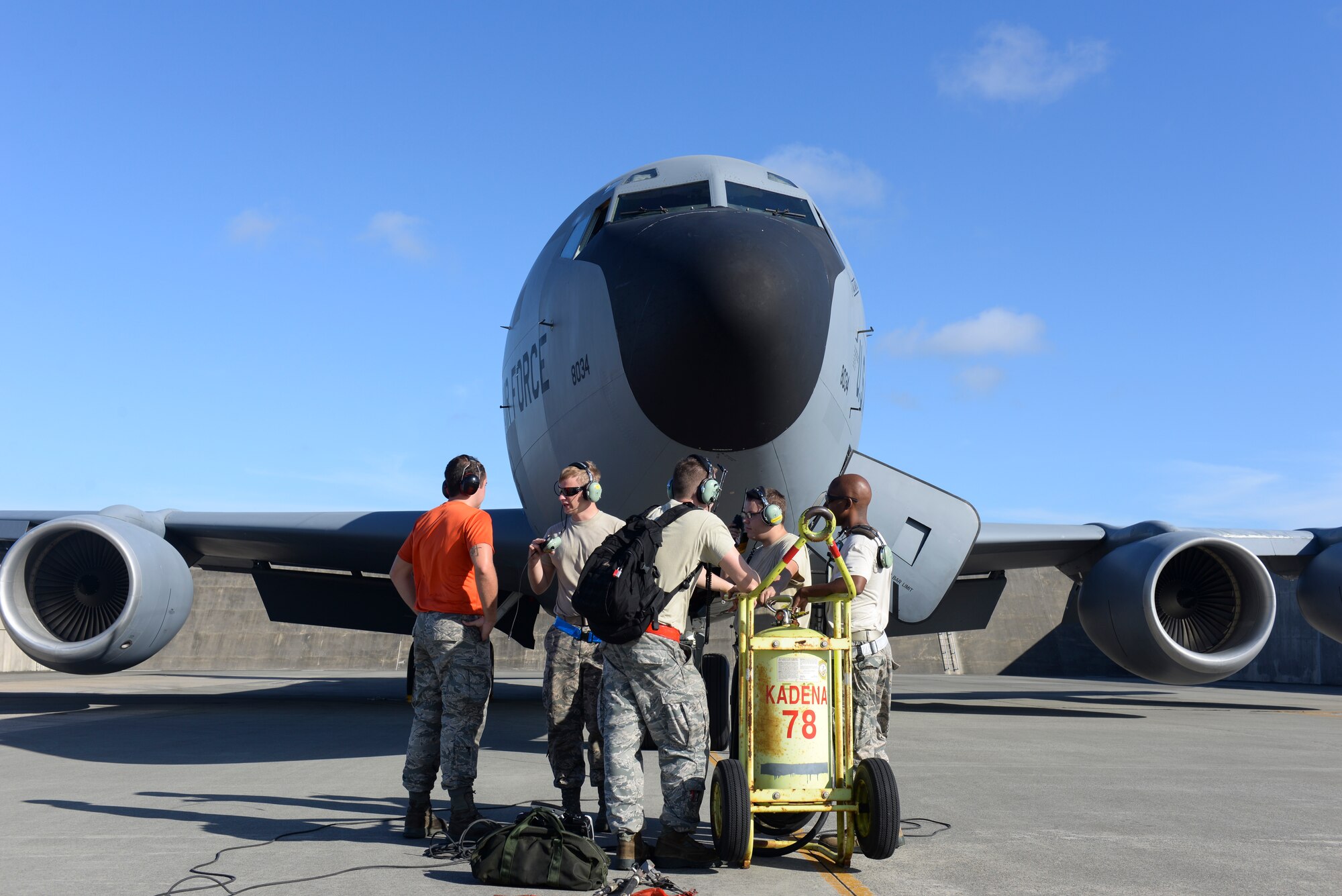 U.S. Air Force Airmen of the 909th Maintenance Squadron on Kadena Air Base, Japan, prepare a KC-135 Stratotanker to relocate to another installation to avoid Typhoon Goni Aug. 8, 2015. In standard preparation of typhoons like Typhoon Goni, which is slated to strike this weekend, numerous flying squadrons on the base relocate their aircraft to other bases in the region to protect them from possible damaging winds and debris. (U.S. Air Force photo by Senior Airman Omari Bernard)