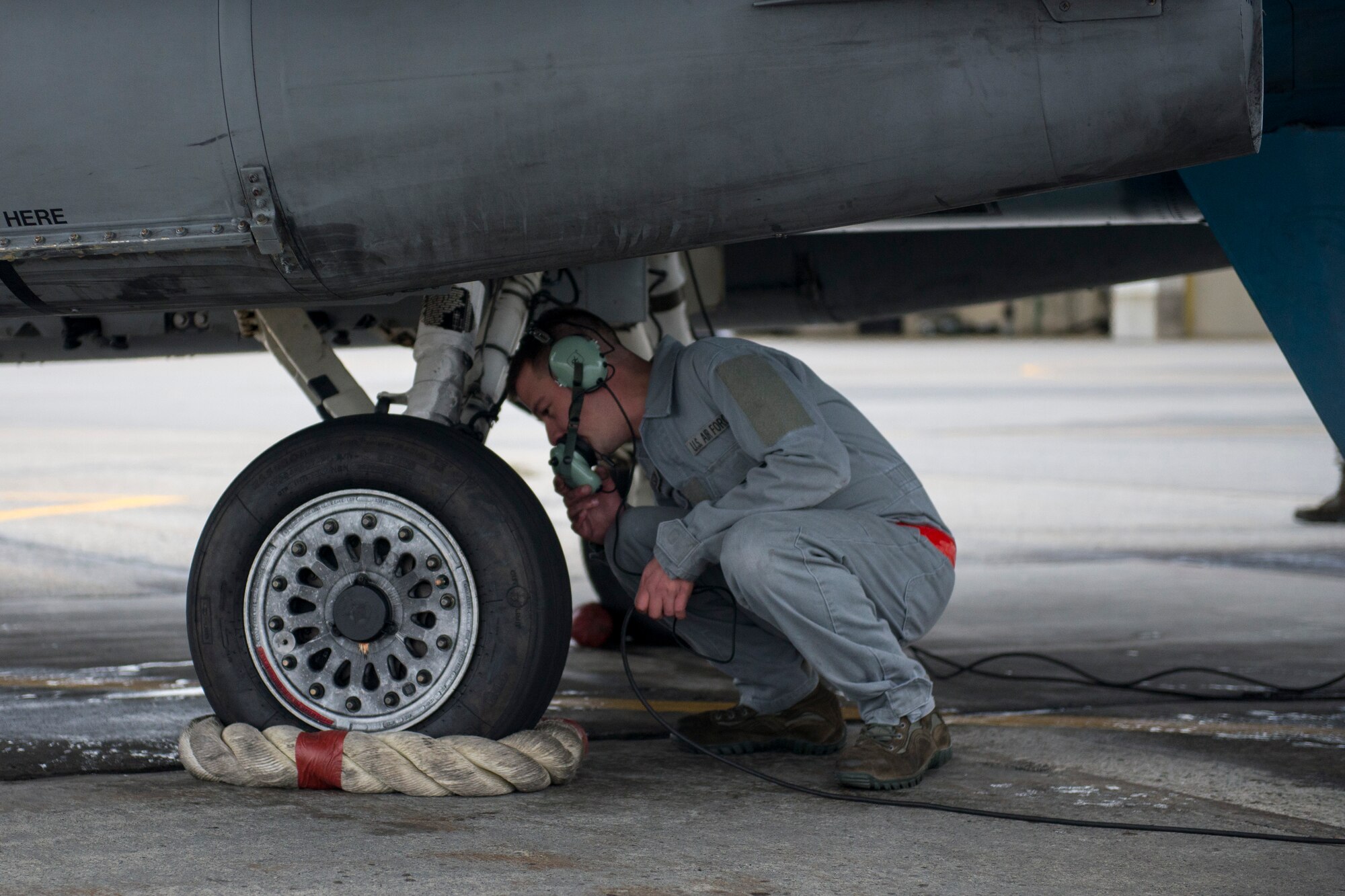 U.S. Air Force Airman 1st Class Jason Watson, a 354th Aircraft Maintenance Squadron crew chief, inspects an 18th Aggressor Squadron F-16 Fighting Falcon, Aug. 19, 2015, prior to the launch of a RED FLAG-Alaska (RF-A) 15-3 sortie from Eielson Air Force Base, Alaska. Airmen with the 354th Maintenance Group ensure the Aggressors can maximize training for participants of RF-A, a Pacific Air Forces commander-directed field training exercise for U.S. and partner nation forces, providing combined offensive counter-air, interdiction, close air support and large force employment training in a simulated combat environment. (U.S. Air Force photo by 1st Lt. Elias Zani/Released)