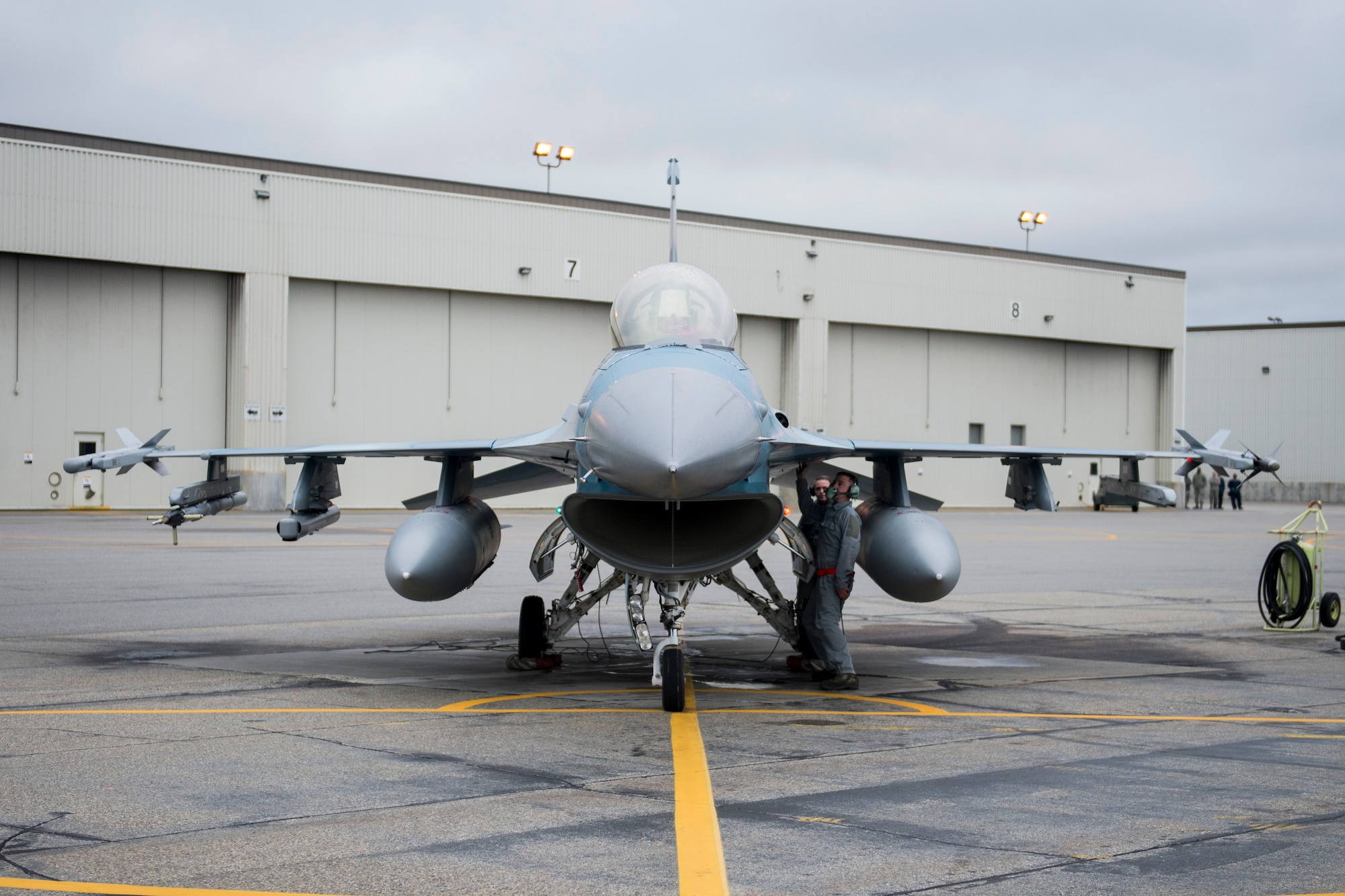 U.S. Air Force Airmen 1st Class Jason Watson and Bryan Bateman, both 354th Aircraft Maintenance Squadron crew chiefs, inspect an 18th Aggressor Squadron F-16 Fighting Falcon, Aug. 19, 2015, prior to the launch of a RED FLAG-Alaska (RF-A) 15-3 sortie from Eielson Air Force Base, Alaska. The support of the 354th Maintenance Group’s Airmen ensure the pilots of the 18th Aggressor Squadron can act as enemy “Red” forces to employ real-world tactics that require coalition “Blue” forces to adjust quickly, work together and overcome challenges during simulated combat sorties throughout RF-A. (U.S. Air Force photo by 1st Lt. Elias Zani/Released)