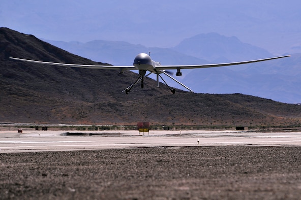 An MQ-1B Predator remotely piloted aircraft comes in for a 'touch-and-go' during a training mission, May 13, 2013. The MQ-1B Predator is an armed, multi-mission, medium-altitude, long-endurance remotely piloted aircraft that is employed primarily as an intelligence-collection asset and secondarily for munitions capability to support ground troops and base defense. (U.S. Air Force photo by 432nd Wing/432nd Air Expeditionary Wing/Released)