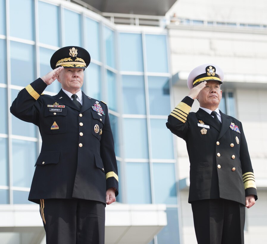 U.S. Army Gen. Martin E. Dempsey, left, chairman of the Joint Chiefs of Staff, and his South Korean counterpart, Adm. Choi Yoon-hee, salute during an honor ceremony at the headquarters of the South Korean Joint Chiefs of Staff in Seoul, South Korea, March 27, 2015. Dempsey is visiting Seoul as part of a two-day trip to reinforce the U.S.-South Korean alliance. DoD photo by U.S. Navy Petty Officer 1st Class Daniel Hinton
